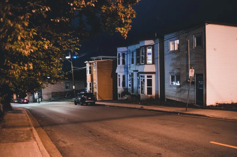 Camera 1 view: the driveway approach after dark