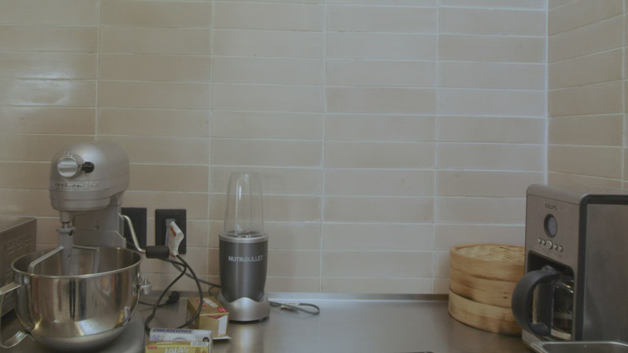 Still from a client interview filmed in a finished Northstone kitchen